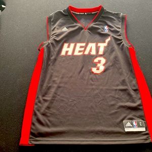 New, never used large Dwane Wade Jersey, MIAMI HEAT